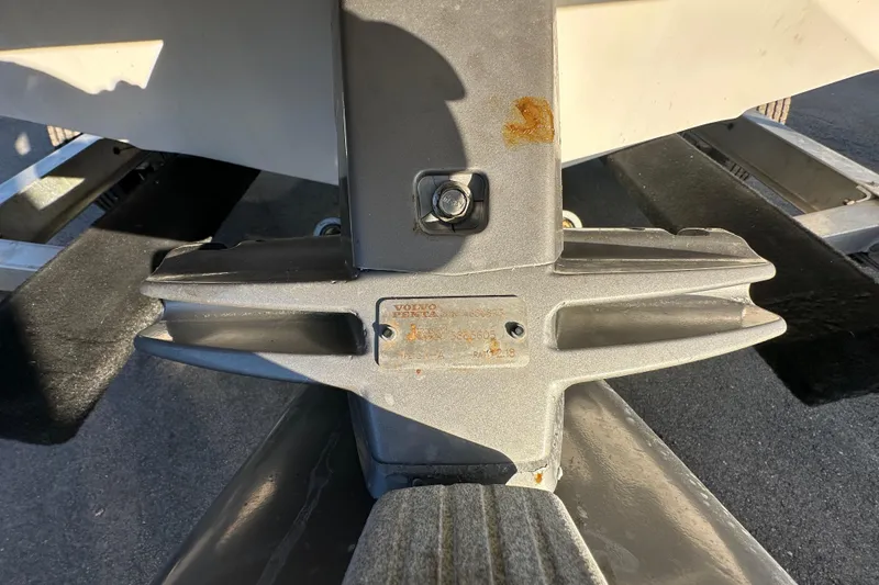 Slide: The Image of Close-up of a 2017 Regal 1900 Bowrider boat's Volvo Penta outdrive. - 12