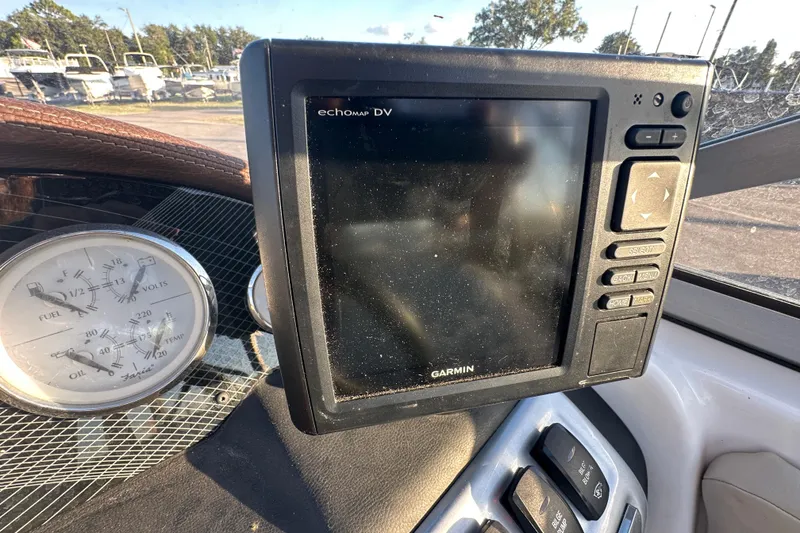 Slide: The Image of Garmin echomap DV on 2017 Regal 1900 Bowrider dashboard with gauges and controls. - 31