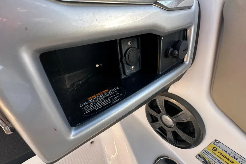 Slide: The Image of 2017 Regal 1900 Bowrider dashboard with speaker and control panel. - 33