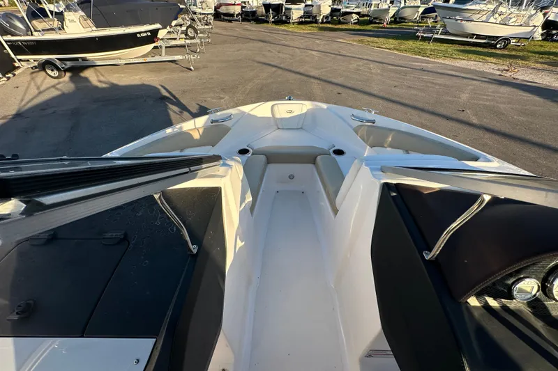 Slide: The Image of 2017 Regal 1900 Bowrider boat interior with seating and cup holders. - 36