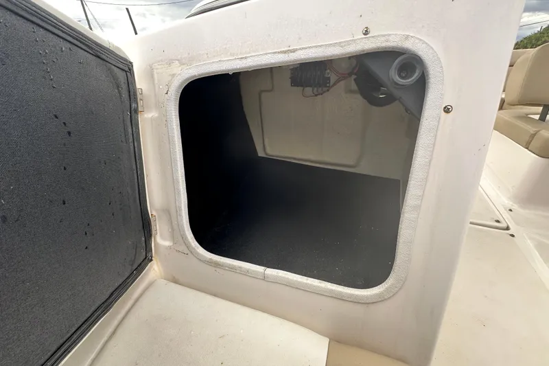 Slide: The Image of Open storage compartment on a 2017 Regal 1900 Bowrider boat. - 46