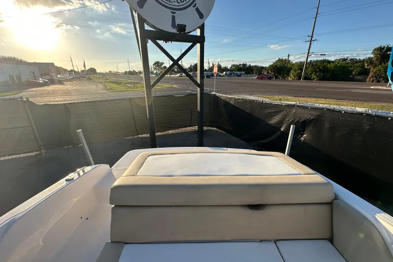 Slide: The Image of 2017 Regal 1900 Bowrider boat interior with sunset view. - 61