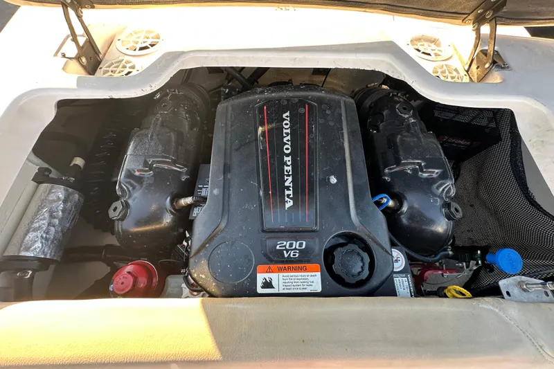 Slide: The Image of Volvo Penta engine in 2017 Regal 1900 Bowrider boat, showcasing V6 200 horsepower. - 67