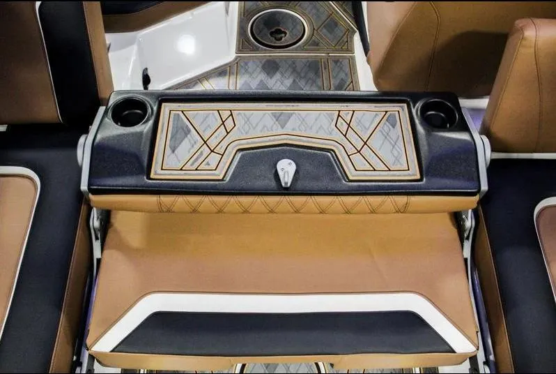 Slide: The Image of 2025 Tigé 22RZX interior with luxurious seating and stylish design details. - 28