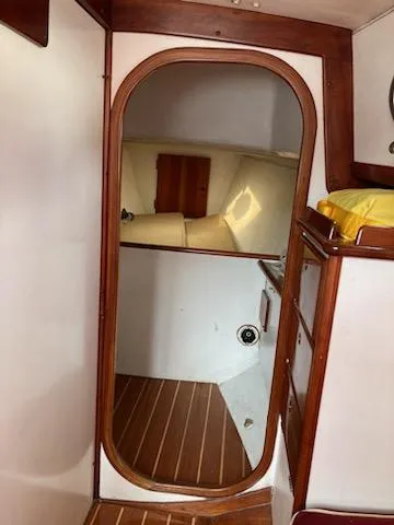 Slide: The Image of Interior view of a 2000 Great Harbour 26 ft. boat with wooden trim. - 13