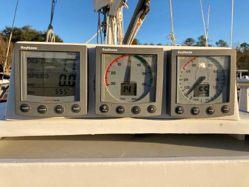 Slide: The Image of Raytheon marine instruments on a 2000 Great Harbour 26 ft. boat dashboard. - 4