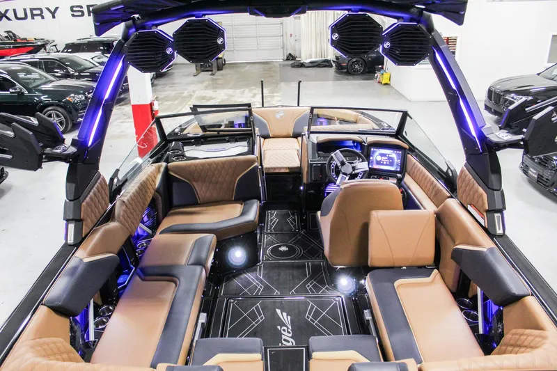 Slide: The Image of 2025 Tigé 22RZX luxury boat interior with modern seating and advanced audio system. - 7