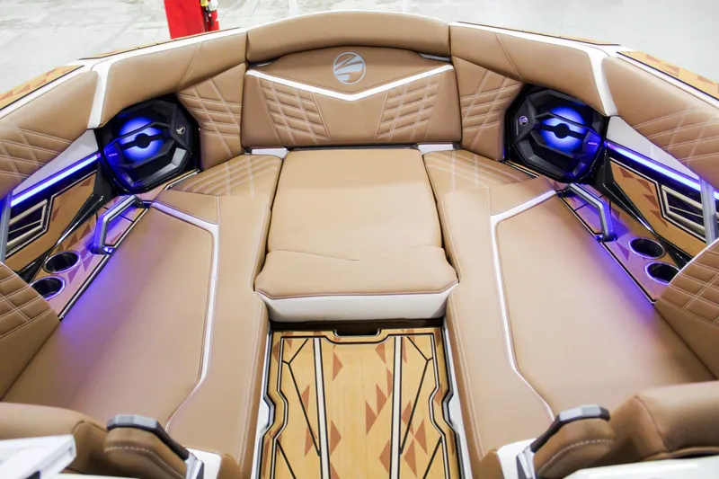 Slide: The Image of 2025 Tigé Ultré 25ZX boat interior with luxurious seating and modern design. - 9