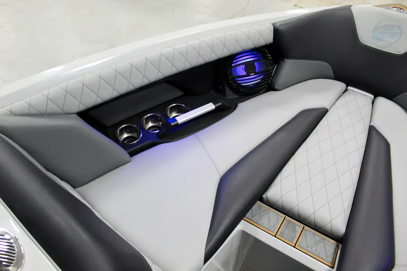 Slide: The Image of 2025 Tigé Z3 boat interior with luxurious seating and ambient lighting. - 11
