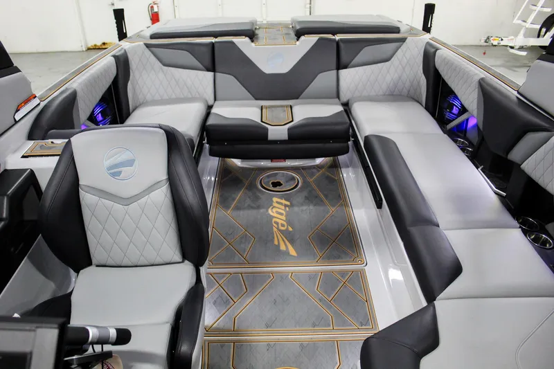 Slide: The Image of 2025 Tigé Z3 boat interior with luxurious seating and modern design. - 13