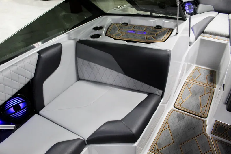 Slide: The Image of 2025 Tigé Z3 boat interior with modern seating and stylish design elements. - 18