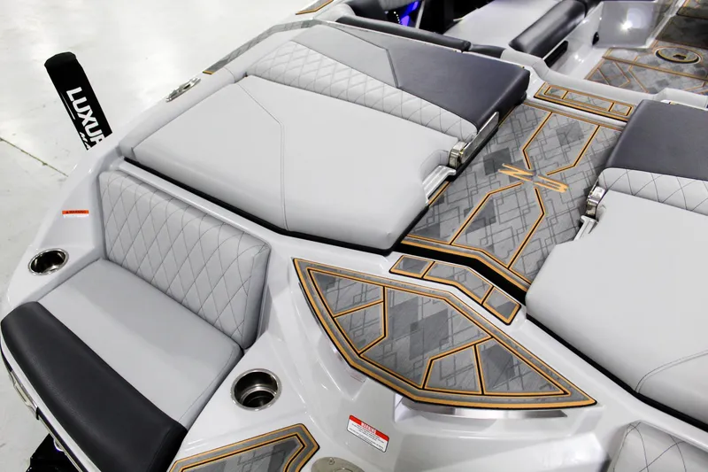 Slide: The Image of 2025 Tigé Z3 boat interior with luxurious seating and stylish geometric design. - 23