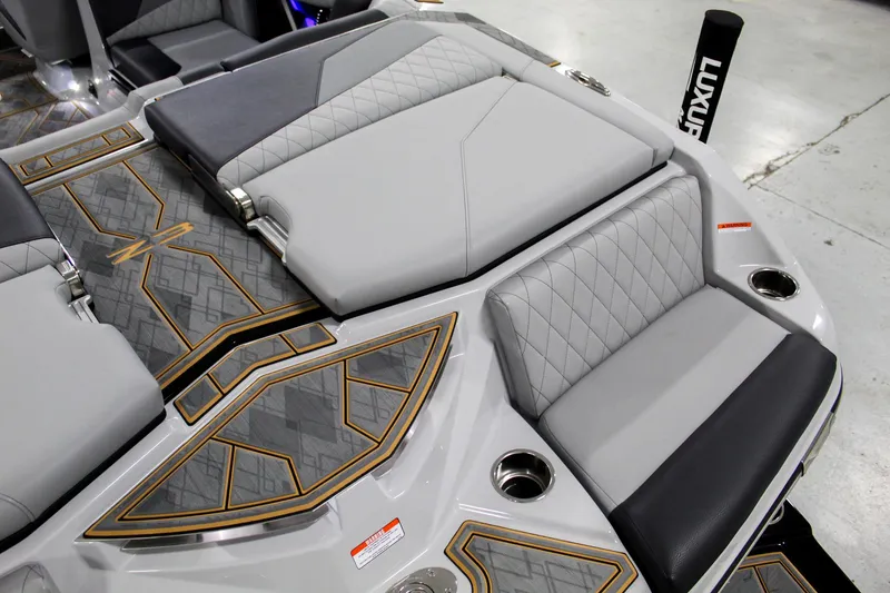 Slide: The Image of 2025 Tigé Z3 boat interior with luxurious seating and stylish design. - 24