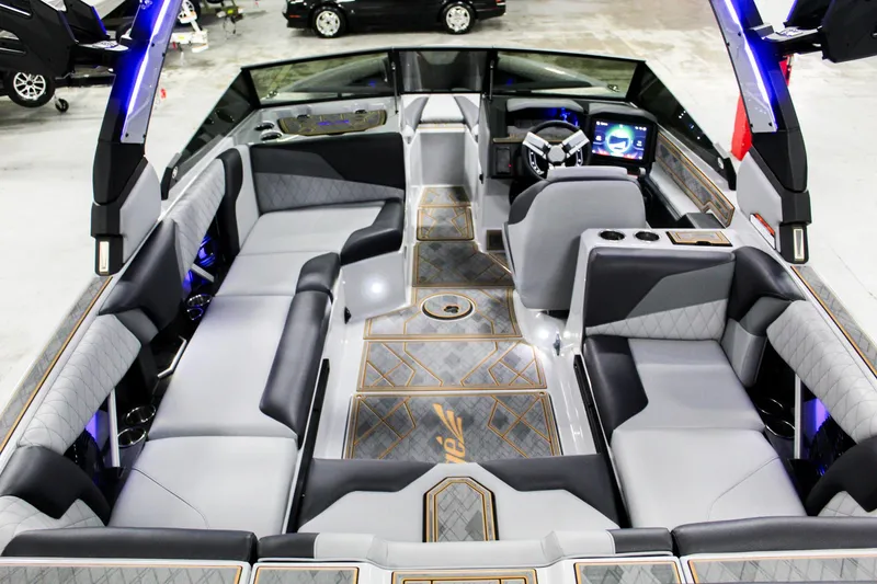 Slide: The Image of 2025 Tigé Z3 boat interior with luxurious seating and modern dashboard design. - 25
