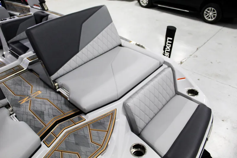 Slide: The Image of 2025 Tigé Z3 boat interior with luxurious gray seating and stylish design. - 27