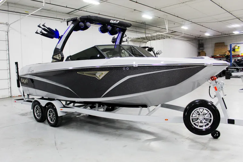 Slide: The Image of 2025 Tigé Z3 boat in a showroom, featuring sleek design and modern features. - 7