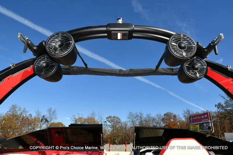 Slide: The Image of 2022 Tigé 24RZX boat speakers and tower against a clear blue sky. - 3