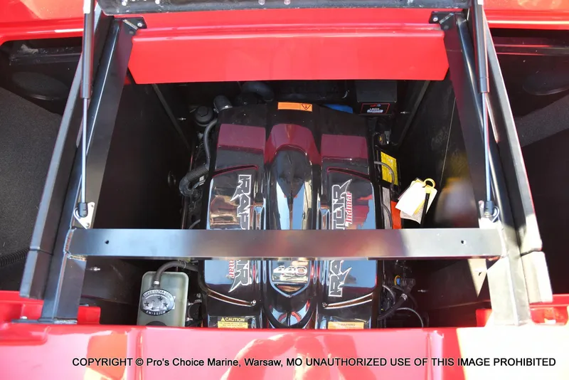 Slide: The Image of Engine compartment of a 2022 Tigé 24RZX boat, featuring a Raptor motor. - 47
