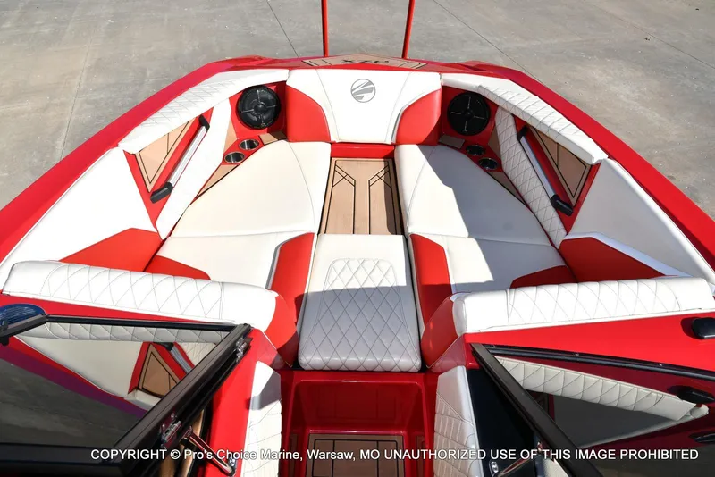 Slide: The Image of 2022 Tigé 24RZX boat interior with red and white seating, featuring modern design elements. - 6