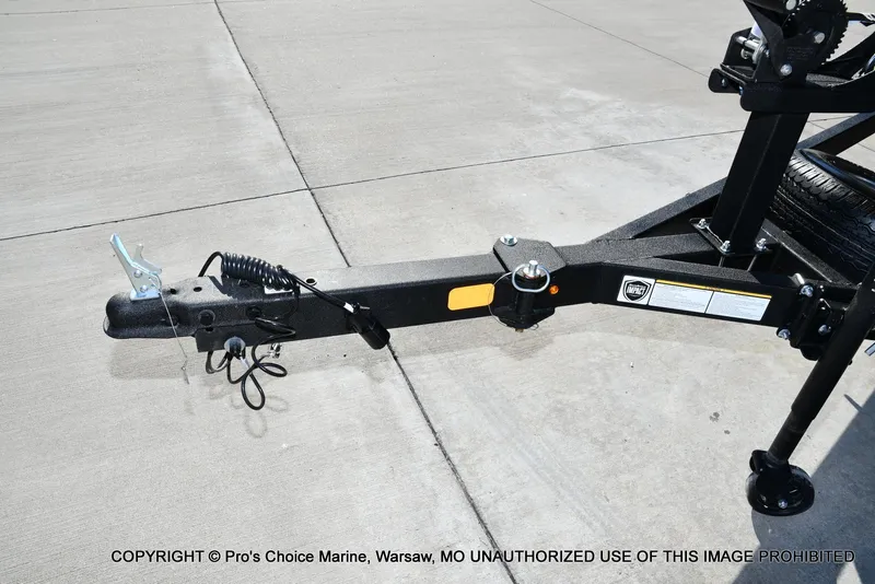 Slide: The Image of Trailer hitch of 2025 Tracker Pro Guide V-175 Combo on concrete surface. - 19