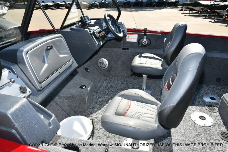 Slide: The Image of 2025 Tracker Pro Guide V-175 Combo boat interior with two seats and control panel. - 25