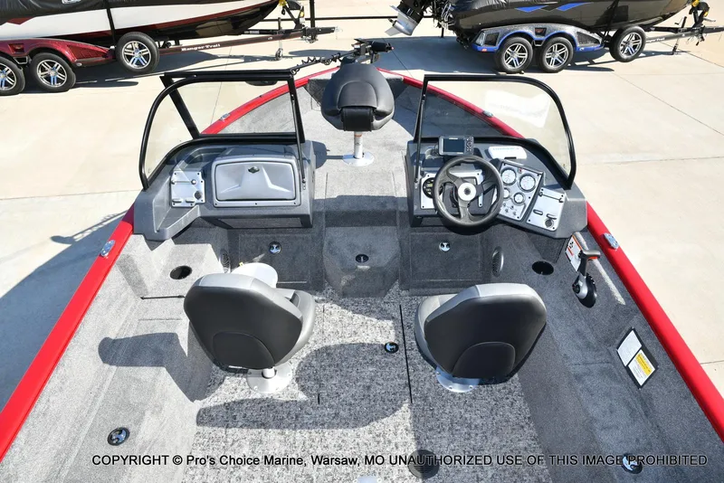 Slide: The Image of 2025 Tracker Pro Guide V-175 Combo boat interior with dual seats and control panel. - 27
