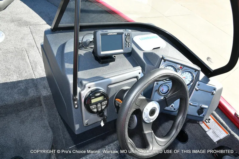 Slide: The Image of 2025 Tracker Pro Guide V-175 Combo dashboard with steering wheel and navigation system. - 31