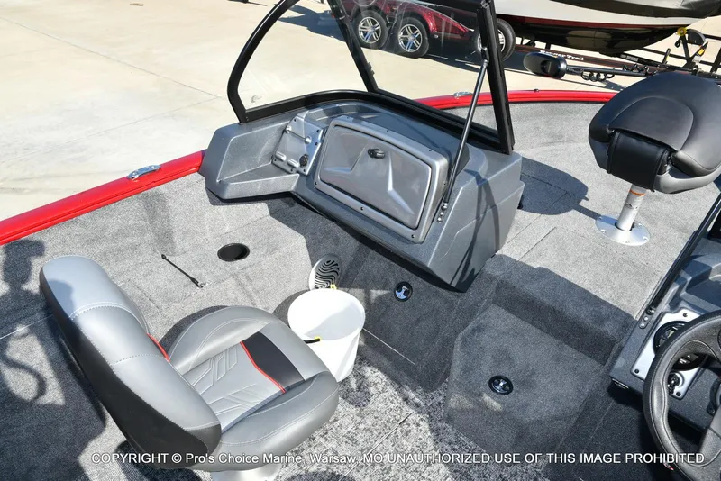 Slide: The Image of 2025 Tracker Pro Guide V-175 Combo boat interior with seating and storage compartments. - 35