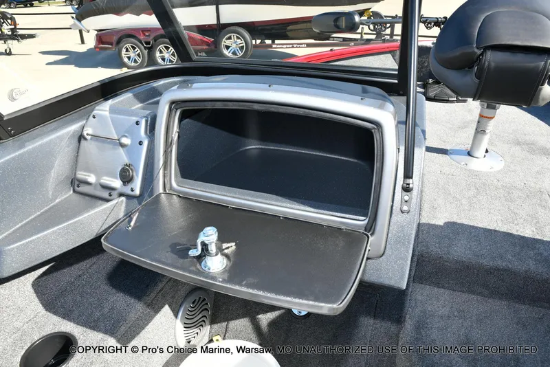 Slide: The Image of 2025 Tracker Pro Guide V-175 Combo boat interior storage compartment with open lid. - 37