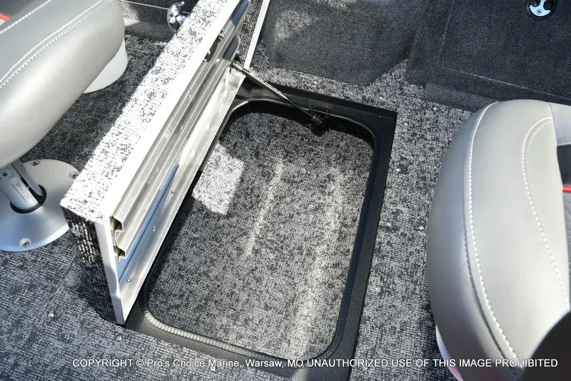 Slide: The Image of 2025 Tracker Pro Guide V-175 Combo boat interior with open storage compartment. - 42