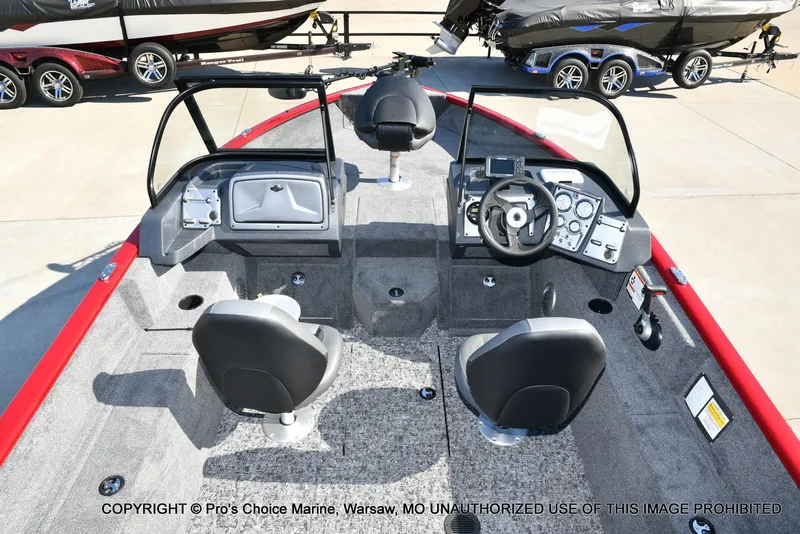 Slide: The Image of 2025 Tracker Pro Guide V-175 Combo boat interior with dual consoles and seating. - 5
