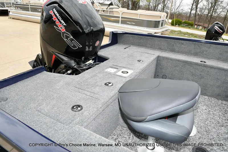 Slide: The Image of 2025 Tracker Pro Guide V-175 Walk-Thru boat interior with Mercury Pro XS engine. - 4