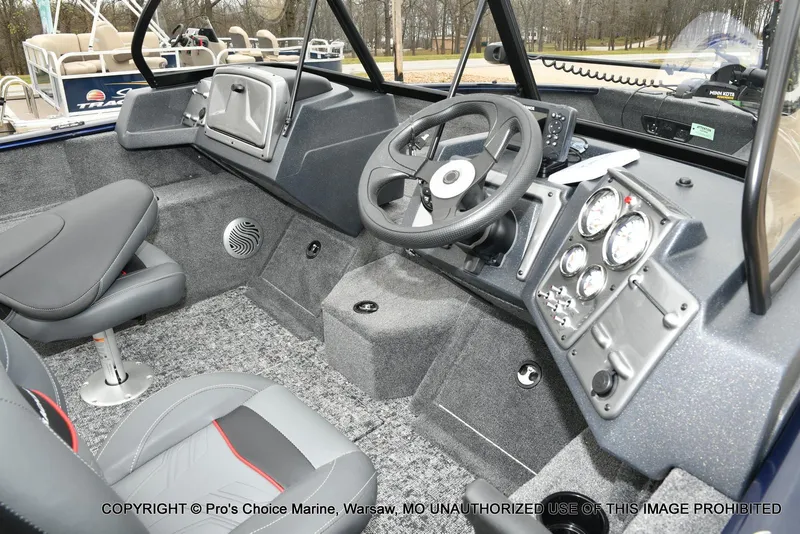 Slide: The Image of Interior of 2025 Tracker Pro Guide V-175 Walk-Thru boat with steering wheel and dashboard. - 6