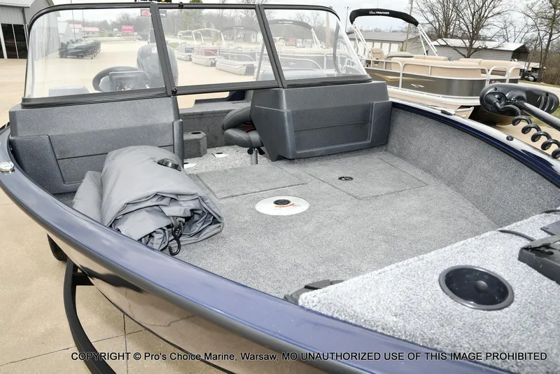 Slide: The Image of 2025 Tracker Pro Guide V-175 Walk-Thru boat interior with seating and storage. - 8