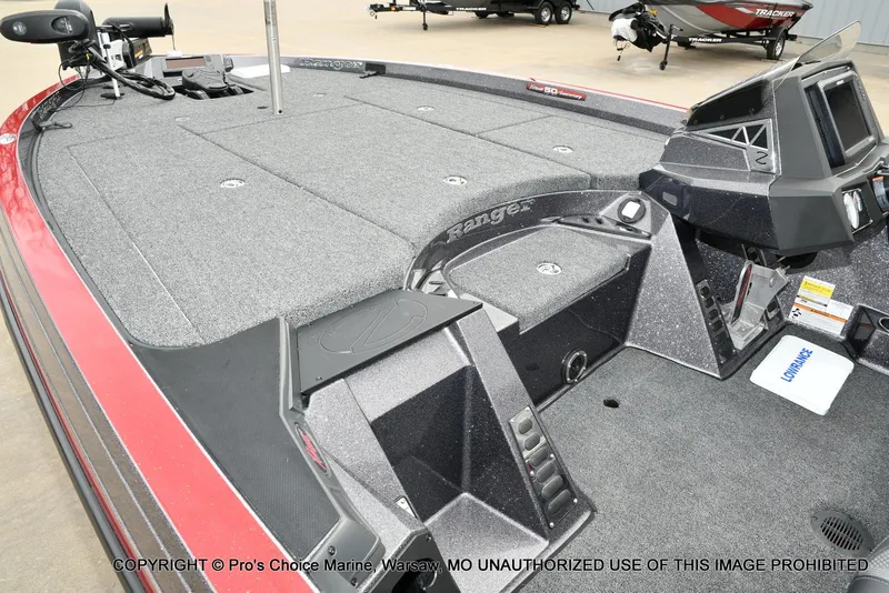 Slide: The Image of 2018 Ranger Z520L CUP boat interior with advanced controls and spacious deck. - 11