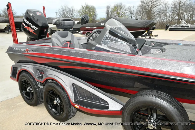 Slide: The Image of 2018 Ranger Z520L CUP boat with Mercury engine, parked on a trailer. - 14