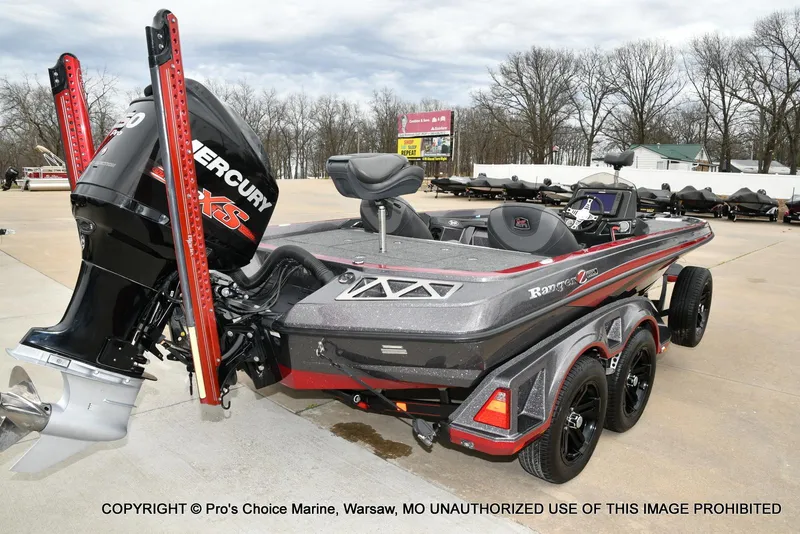 Slide: The Image of 2018 Ranger Z520L CUP boat with Mercury engine, parked outdoors on a concrete surface. - 15