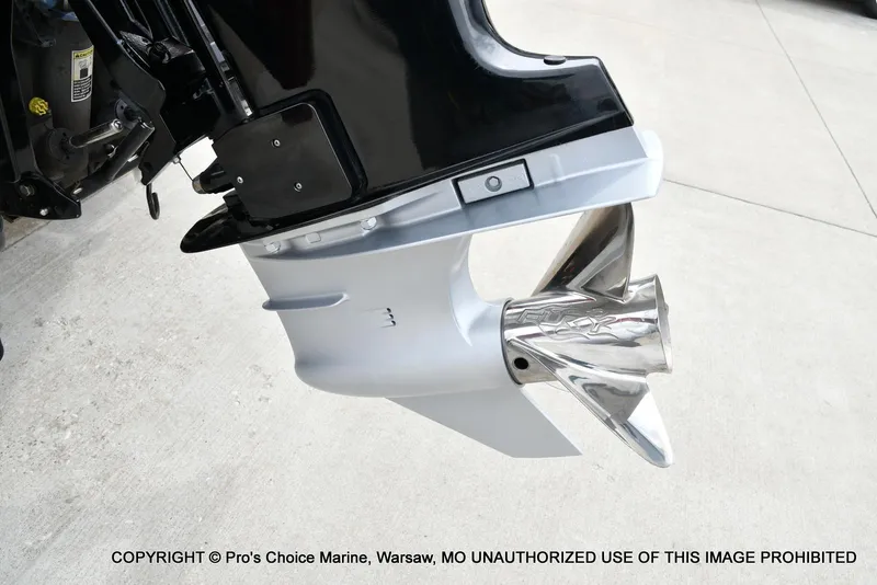 Slide: The Image of 2018 Ranger Z520L CUP boat motor with stainless steel propeller on concrete surface. - 20