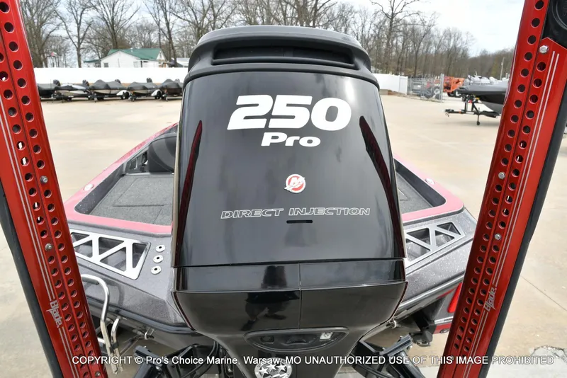 Slide: The Image of 2018 Ranger Z520L CUP boat with 250 Pro Direct Injection engine, parked outdoors. - 22