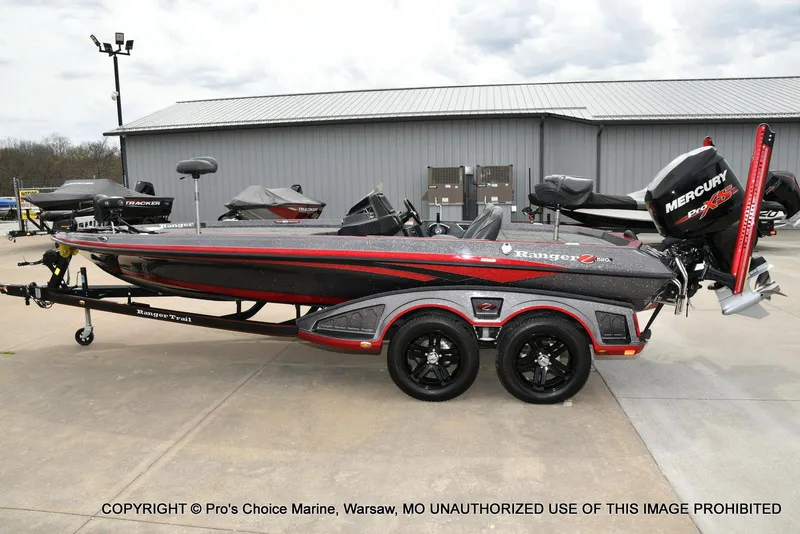 Slide: The Image of 2018 Ranger Z520L CUP boat with Mercury Pro XS engine, parked on a trailer. - 24
