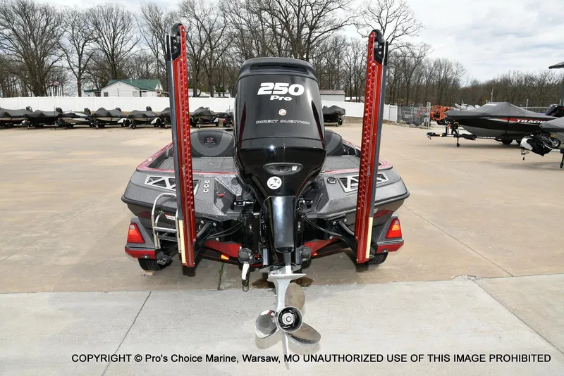 Slide: The Image of 2018 Ranger Z520L CUP boat with 250 Pro engine, parked outdoors. - 3