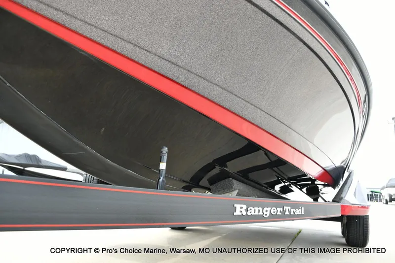 Slide: The Image of 2018 Ranger Z520L CUP boat on Ranger Trail trailer, featuring sleek black and red design. - 31
