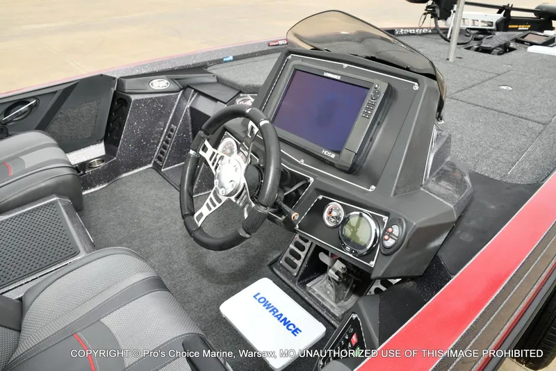Slide: The Image of 2018 Ranger Z520L CUP boat interior with steering wheel and Lowrance fishfinder. - 37