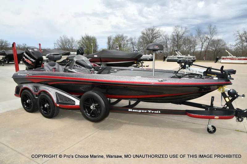 Slide: The Image of 2018 Ranger Z520L CUP boat with trailer, parked outdoors on a concrete surface. - 77