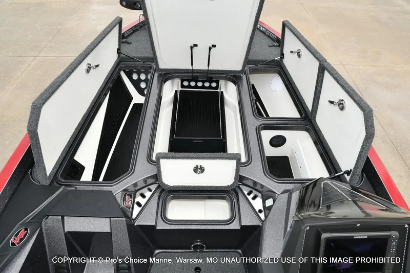 Slide: The Image of 2018 Ranger Z520L CUP boat storage compartments open, showcasing organized interior layout. - 9