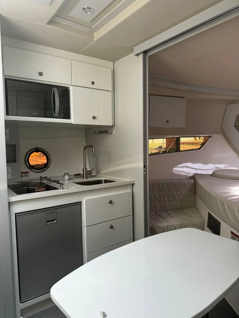 Slide: The Image of Modern bathroom in 2021 Evolve 400HT yacht with sleek design and compact layout. - 13