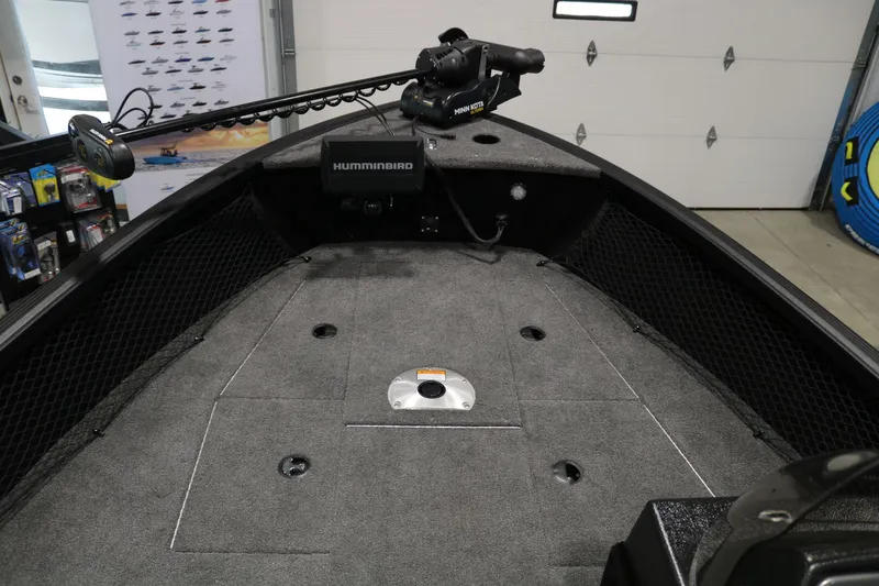 Slide: The Image of 2023 Alumacraft Competitor 185 CS boat deck with Humminbird and Minn Kota equipment. - 8