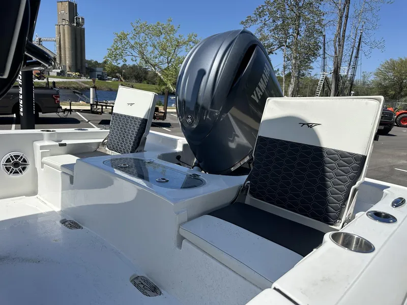Slide: The Image of 2025 Tidewater 2110 Bay Max boat interior with Yamaha engine, featuring comfortable seating and modern design. - 10