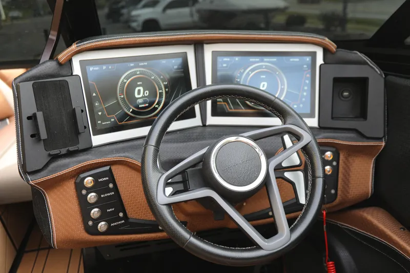 Slide: The Image of 2021 Centurion Ri245 dashboard with dual digital displays and modern steering wheel. - 13