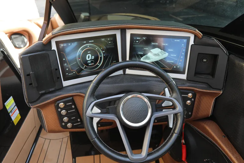Slide: The Image of 2021 Centurion Ri245 dashboard with dual digital displays and steering wheel. - 9
